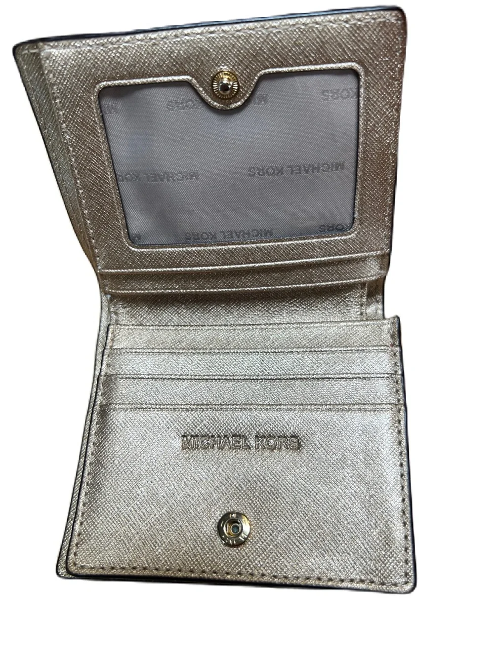MICHAEL KORS Gold wallet in Saffiano Coated Leather.